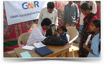 Image of doctor conducting a check-up on school children