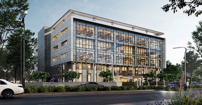 Modern commercial office building with glass facade and landscaped surroundings, ideal for IT and corporate businesses in an urban setting.