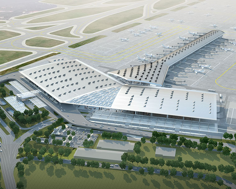 Delhi Airport Terminal 3 with landscaped garden and clear blue sky.