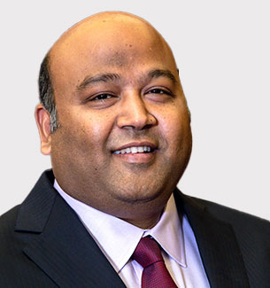 Portrait of Kiran Kumar Grandhi, a leader in GMR Group.